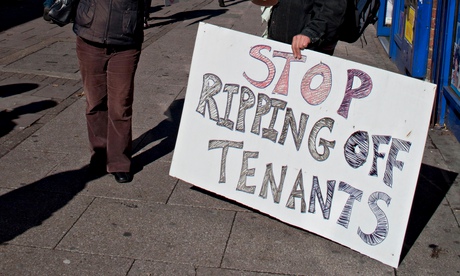 Housing protesters with placards