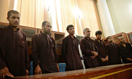 Seven men sentenced to death for the gang-rape of four women, at court in Kabul.