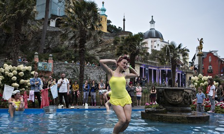 Festival No6 - Performers in the fountain Portmeirion's piazza