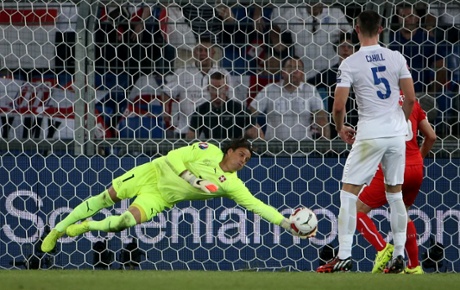 Yann Sommer makes a smart save from a Phil Jones header.