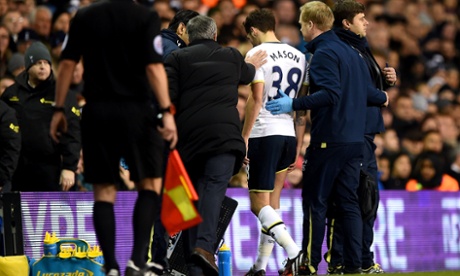 José Mourinho pats Ryan Mason of Spurs on the back as he leaves the pitch with an injury.