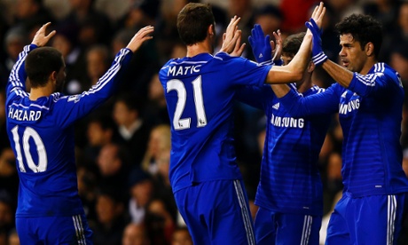 Diego Costa celebrates with team-mates after scoring the opening goal during the Premier League match between Tottenham Hotspur and Chelsea.
