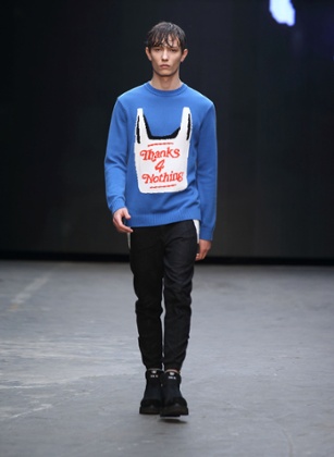 A model in a statement knit at Christopher Shannon