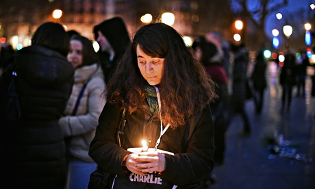 Members of the public pay tribute to the terror victims at Place de la Republique in Paris, France