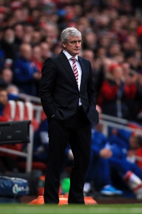 Mark Hughes on the touchline.