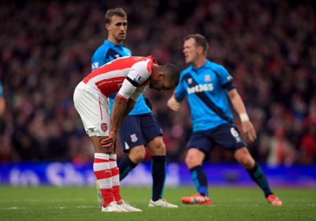 Theo Walcott reacts after missing a chance.