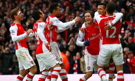Arsenal's Alexis Sanchez (2nd R, partially obscured) celebrates his second goal with teammates during their English Premier League soccer match against Stoke City at the Emirates Stadium in London January 11, 2015.   REUTERS/Eddie Keogh (BRITAIN  - Tags: SPORT SOCCER TPX IMAGES OF THE DAY) EDITORIAL USE ONLY. NO USE WITH UNAUTHORIZED AUDIO, VIDEO, DATA, FIXTURE LISTS, CLUB/LEAGUE LOGOS OR 'LIVE' SERVICES. ONLINE IN-MATCH USE LIMITED TO 45 IMAGES, NO VIDEO EMULATION. NO USE IN BETTING, GAMES OR SINGLE CLUB/LEAGUE/PLAYER PUBLICATIONS.FOR EDITORIAL USE ONLY. NOT FOR SALE FOR MARKETING OR ADVERTISING CAMPAIGNS.:rel:d:bm:LR2EB1B15RZ5F