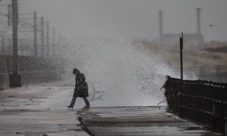 A storm driven wave crashes against the sea wall at Saltcoats.