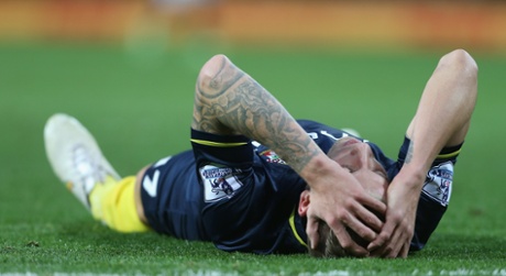 Toby Alderweireld of Southampton lies injured.