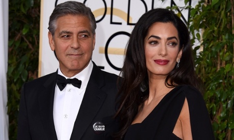 George and Amal Alamuddin Clooney attend the Golden Globes.