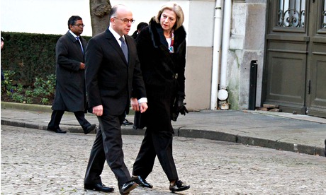 The French interior minister, Bernard Cazeneuve, with the British home secretary, Theresa May, in Pa
