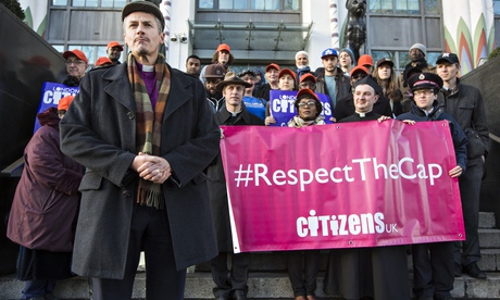 The bishop of Stepney, the Rt Revd Adrian Newman, and others demonstrate in support of lending cap 