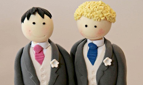 A wedding cake topper for a civil partnership ceremony