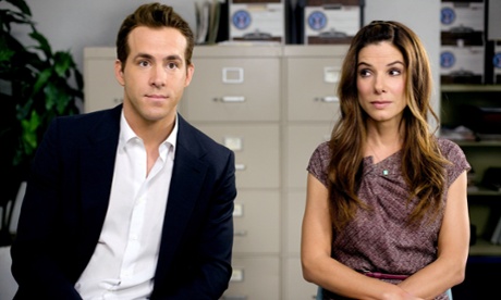 Obtaining a US green card is often a source of movie comedy – see The Proposal, pictured. But in real life, it’s none too funny.