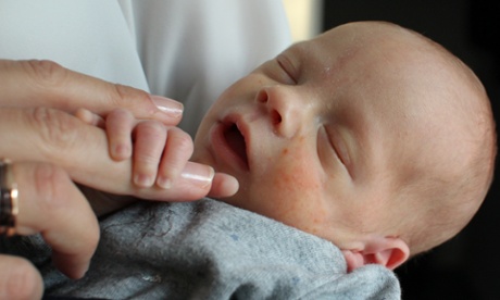 baby and parent's hand