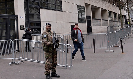 A soldier guards a Jewish pre-school in Paris