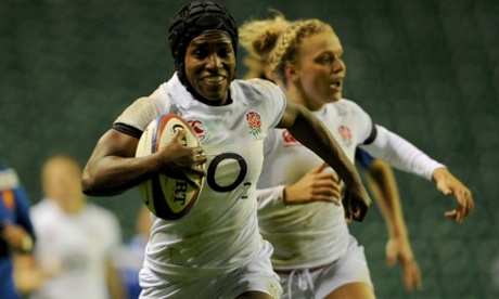 England's Maggie Alphonsi breaks through to score a try during the International match between England Women v France Women at Twickenham Stadium on November 9, 2013.