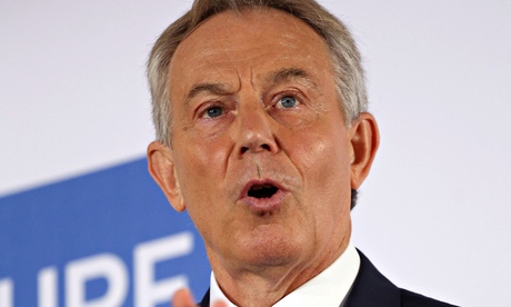 Tony Blair speaking with his hand held out