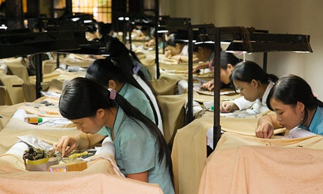 Young women working in embroidery workshop in Vietnam