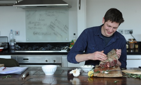 a man preparing a lamb joint