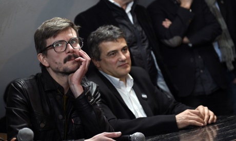 Charlie Hebdo cartoonist Renald Luzier, aka Luz, (l) and columnist Dr Patrick Pelloux (c) at the press conference in Paris.