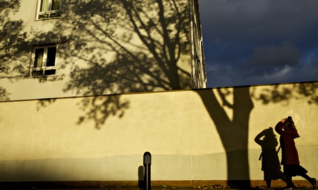 Child in Salford with tree reflection