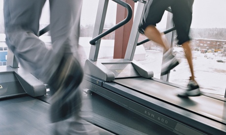 Women running on a treadmill in the gym