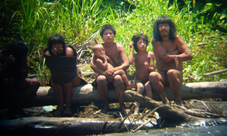 Members of the Mashco-Piro tribe observe a group of travelers from across the Alto Madre de Dios river in the Manu National Park in the Amazon basin of southeastern Peru, as photographed through a bird scope October 21, 2011. Survival International has the Mashco-Piro tribe listed as one of around 100 uncontacted indigenous tribes in the world.  Picture taken October 21, 2011.