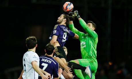 Everton's Joel Robles gets the better of West Ham's Andy Carroll.
