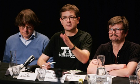 The Charlie Hebdo's cartoonists Cabu, Charb and Luz attend a press conference at Theatre du Rond-Point on November 3, 2011 in Paris, France. 