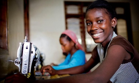 Young girls sewing in Tanzania.