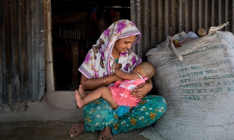 Woman breastfeeding in Bangladesh.