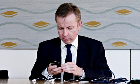 Michael Gove with his mobile phone