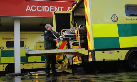 A patient is taken from an ambulance outside the Accident and Emergency ward at St Thomas' Hospital on 6 January, 2015.