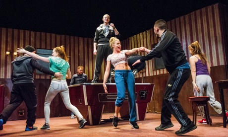 Steven Miller (Iago), centre, in Othello by William Shakespeare at the Lyric, Hammersmith. Frantic Assembly production.