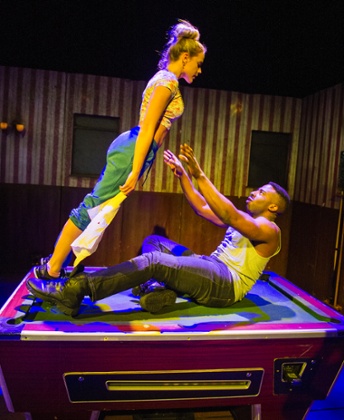 Kirsty Oswald as Desdemona and Mark Ebulue as Othello in Frantic Assembly's Othello.