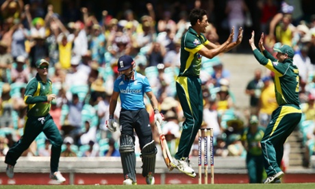 Mitchell Starc celebrates with team mates after taking the wicket of James Taylor.