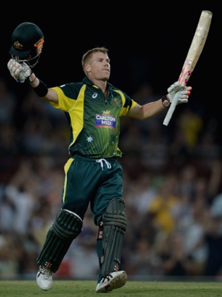 David Warner celebrates reaching his century.