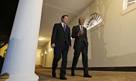 David Cameron and Barack Obama walk together at the White House in Washington