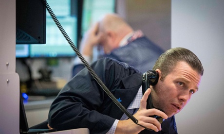 Traders on the floor of the New York Stock Exchange. Photo: Reuters/Brendan McDermid.