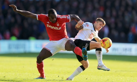 Forest striker Michail Antonio battles with Jamie Ward. Derby have dominated possession but Antonio was unlucky not to be awarded a penalty in the first half.