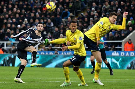 Remy Cabella shoots past Ryan Bertrand and Florin Gardos of Southampton.