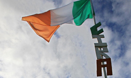 A flagpole bearing the letters CIRA, in a residential estate in Craigavon, Northern Ireland