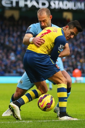Pablo Zabaleta battles with Alexis Sanchez