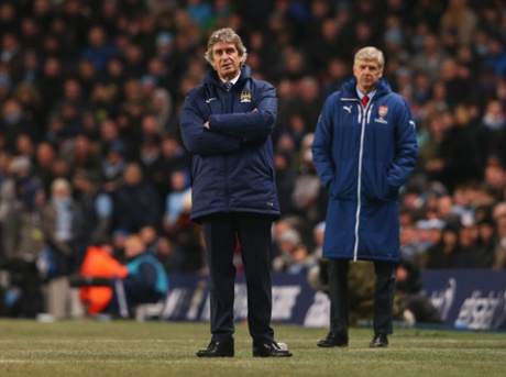 Manuel Pellegrini and Arsene Wenger look on from the touchline