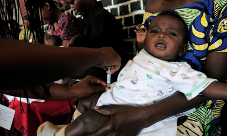 An infant receives a pneumococcal vaccine at the Nyamata health centre in Rwanda.