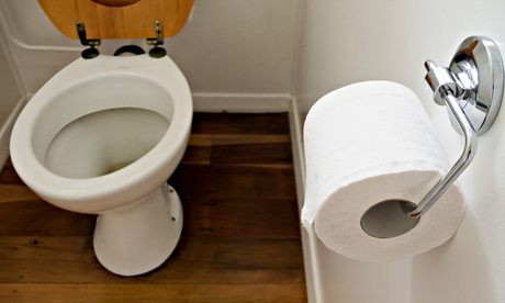 Toilet bowl and paper