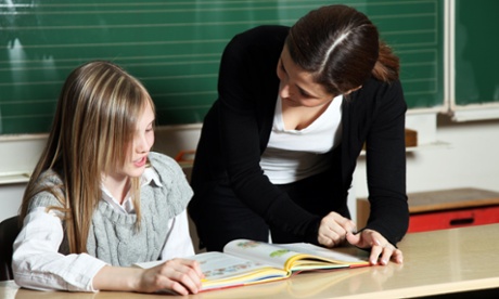 Trainee teacher in classroom.