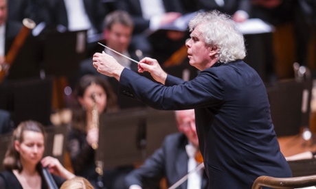 Sir Simon Rattle conducts the London Symphony Orchestra at the Barbican, London, January 2015.