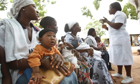 Women listen to a nurse talk about vaccination and nutrition as they sit with their children at the Dodowa new town health outreach point in Dodowa, April 25, 2012. The vaccines - oral rotavirus shots made by GlaxoSmithKline (GSK), and Merck, and pneumococcal shots made by GSK and Pfizer, are in large part funded by the Global Alliance for Vaccines and Immunisation (GAVI), a donor-backed group that funds bulk-buy vaccination programmes for poorer nations that cannot afford to pay developed-economy prices.